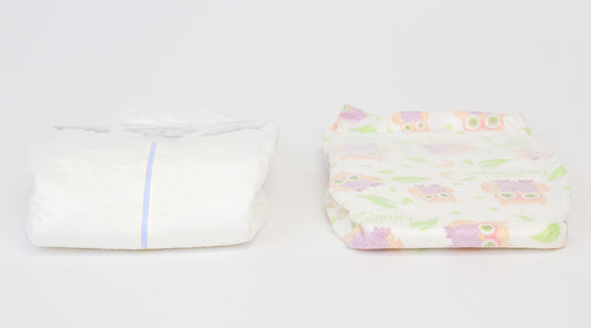 Happy little camper diaper and conventional diaper wetness indicator comparison